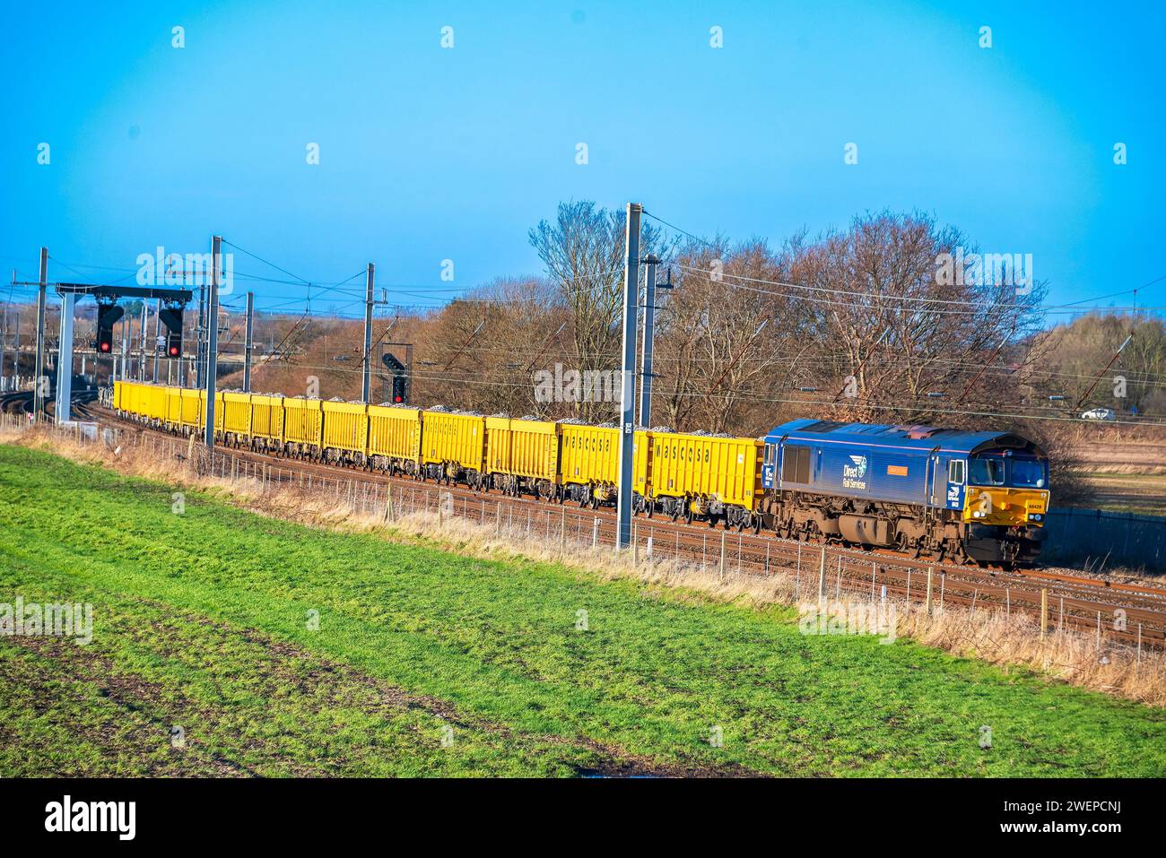 Locomotive de fret diesel de classe 66 DRS la Carlisle Eden a l'intention de transporter des pierres de la carrière de Shap. Banque D'Images