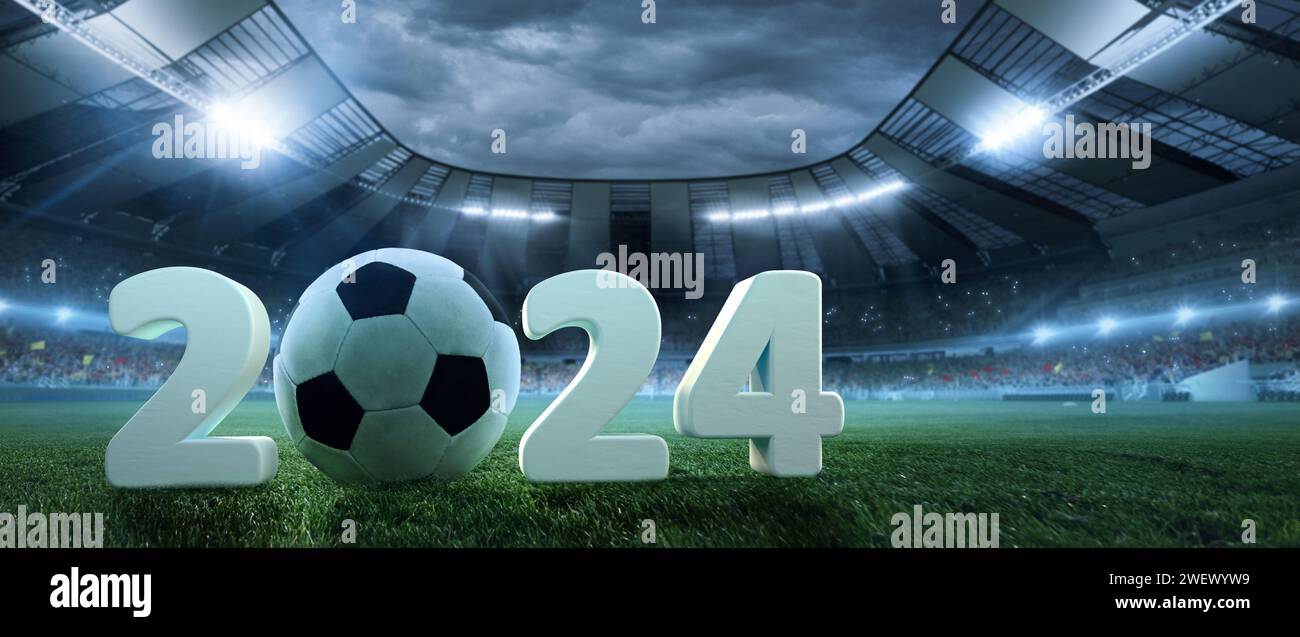 Ballon de football avec 2024 chiffres sur le rendu 3D stade en plein air avec tribune avec des fans, projecteurs. Partie du soir. Affiche Banque D'Images