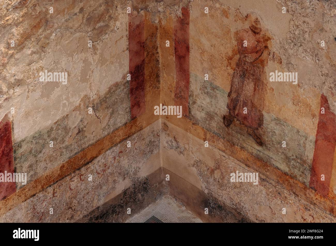 Dernier homme debout. Vestige de fresque romaine tardive, Villa Romana del Casale, Piazza Armerina, Sicile, Italie. Les mosaïques de ce corridor illustrent la chasse aux animaux sauvages destinés à des venationes ou des spectacles de bête. Banque D'Images