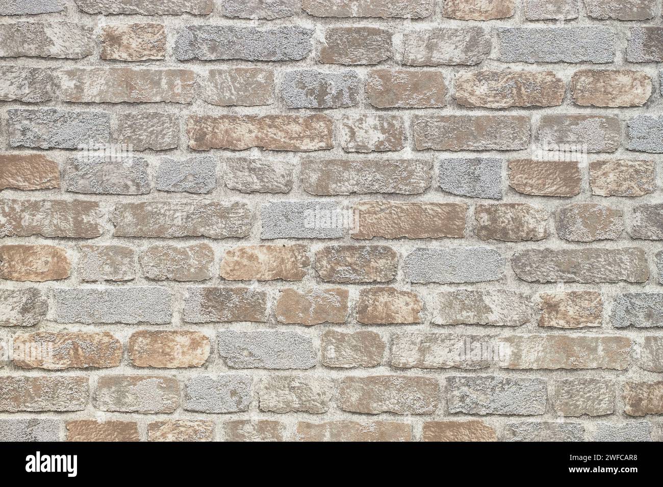motif de fond décoratif de mur de pierre. Gros plan moderne mur de briques de texture de carreaux de pierre beige Banque D'Images