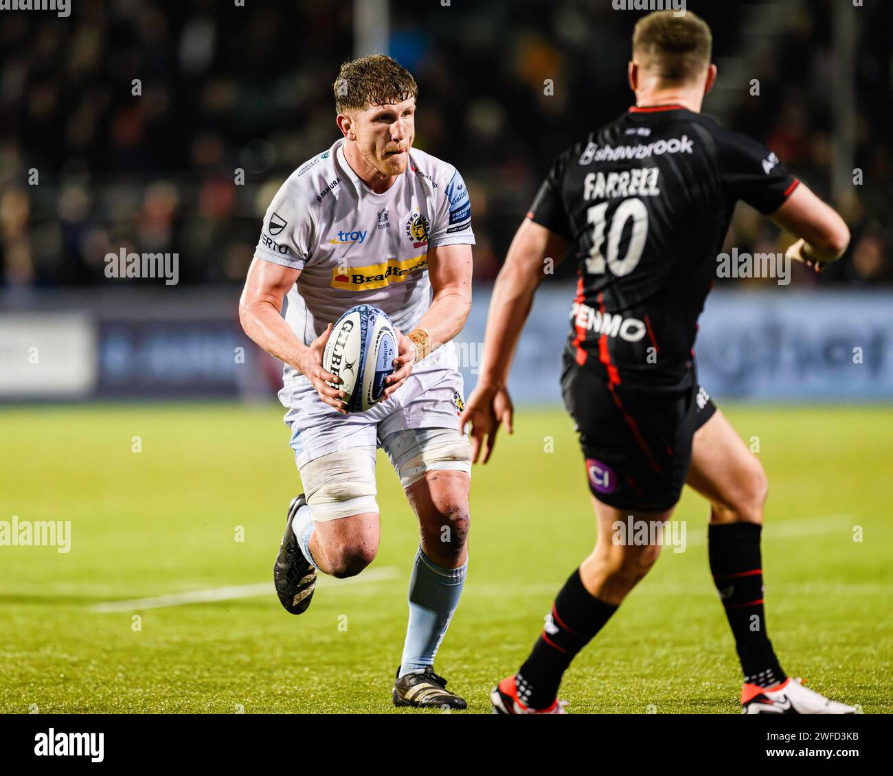 LONDRES, ROYAUME-UNI. 27 janvier 2024. Jacques Vermeulen d'Exeter Chiefs (à gauche) en action pendant Saracens vs Exeter Chiefs Gallagher Premiership Rug Banque D'Images