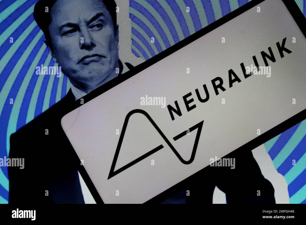 Sleman, Yogyakarta, Indonésie. 31 janvier 2024. Sur cette photo illustrée, le logo de la société américaine de neurotechnologie fondée par Elon Musk pour développer un cerveau implantable » « l’interface informatique, Neuralink, est visible sur l’écran du smartphone. Elon Musk a annoncé que sa société de neurotechnologie, Neuralink, a implanté avec succès une puce dans un cerveau humain pour la première fois. Selon Musk, la puce peut contrôler des appareils ou des gadgets simplement par la pensée. (Image de crédit : © Angga Budhiyanto/ZUMA Press Wire) USAGE ÉDITORIAL SEULEMENT! Non destiné à UN USAGE commercial ! Banque D'Images