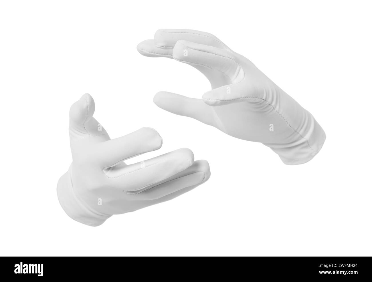 Magicien tenant quelque chose sur fond blanc, gros plan Banque D'Images