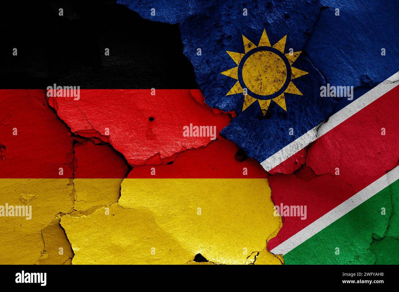 Drapeaux de l'Allemagne et de la Namibie peints sur le mur fissuré Banque D'Images