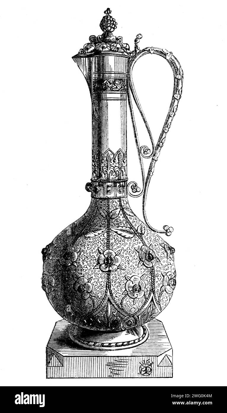 The International Exhibition : Mediaeval Claret-Jug par MM. Hardman and Co., de King-William-Street, Strand, 1862. 'Nous gravirons cette semaine... un Claret-pichet d'aspect très riche, d'argent en partie doré et entièrement de travail martelé et de gravure, aucune pièce n'étant estampillée à la machine. L'ornement des plantes court jusqu'à une fleur, dont le centre porte un carbonnet, la lueur riche de la gemme correspondant très bien avec le dorure, et qui aura également un très bon effet lorsque la cruche sera sur la table contrastée avec d'autres récipients de verre, ou argent givré ou poli. Sur la couverture se trouve également un clust Banque D'Images