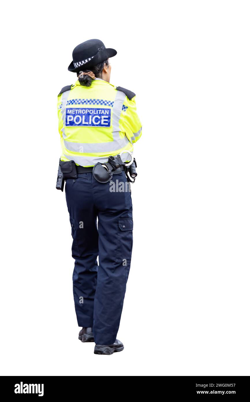 Vue arrière d'une anonyme London Metropolitan Policewoman isolée sur fond blanc avec espace pour le texte Banque D'Images