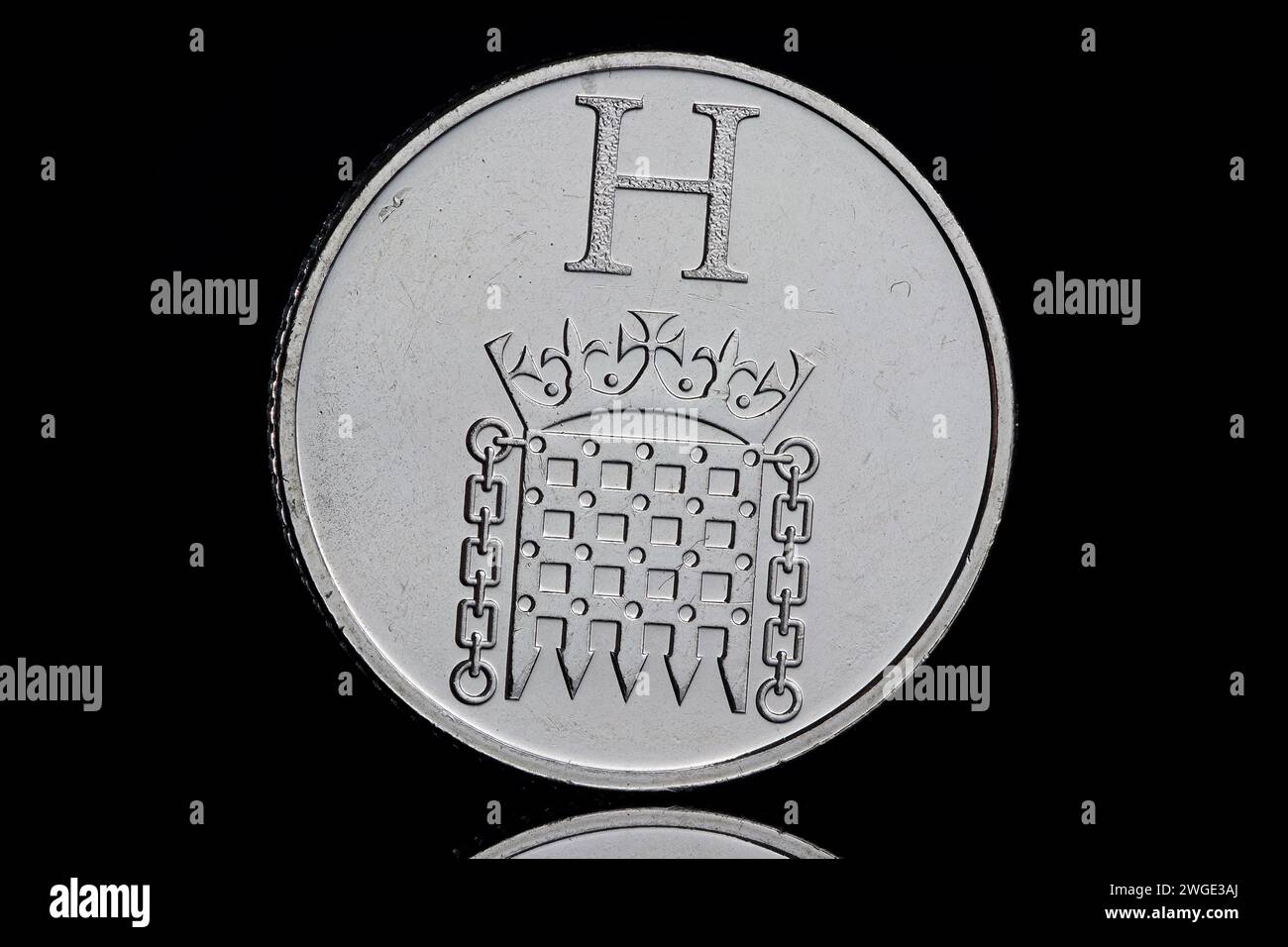 La lettre 'H' pour représenter H pour les chambres du Parlement dans la pièce de 10 pence de la série A à Z Banque D'Images