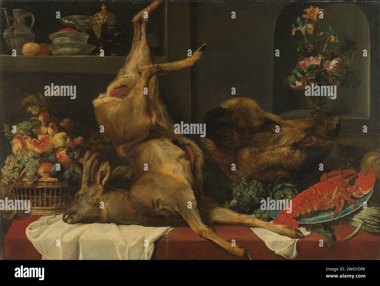 Larder Still Life, Frans Snijders, c. 1616 - c. 1625 peinture de nature morte avec grand gibier mort, fruits et fleurs. Sur une table devant un mur se trouvent un panier avec des raisins, des pêches et des prunes, un cerf ouvert accroché à une jambe, la tête d'un sanglier, des artichauts, un bol avec un homard et un bouquet d'asperges. Un chaton regarde le homard. Dans le fond à gauche dans le mur une niche avec travail vasculaire, à droite une niche avec un bouquet de fleurs dans un vase en verre. peinture à l'huile (peinture). toile peignant des légumes et des fruits ; nature morte des légumes et des fruits. butin de la chasse, du gibier, de la venaison. sti Banque D'Images