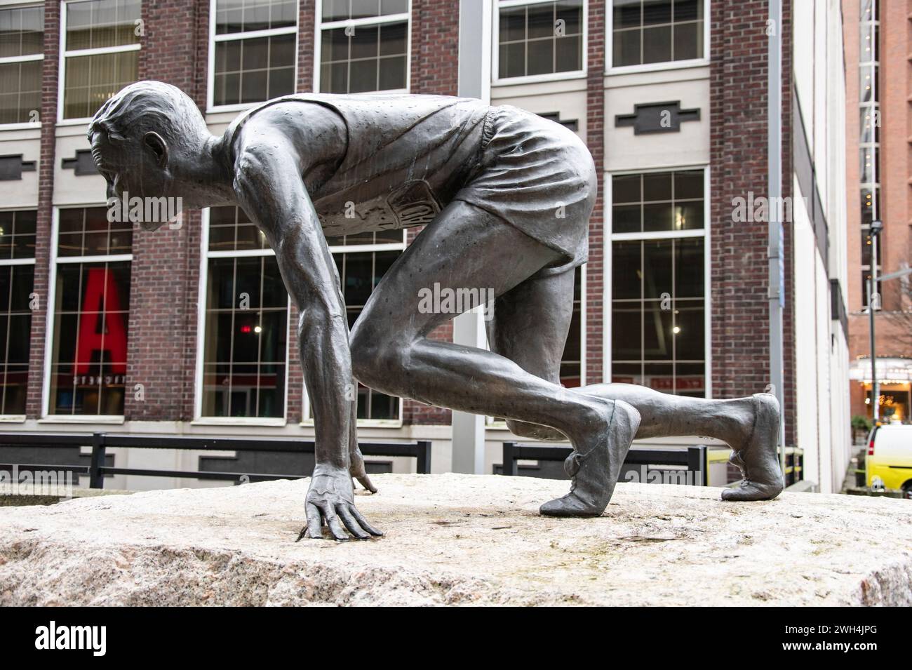 Statue en bronze d'un coureur sur la ligne de départ à BC place à Vancouver, Colombie-Britannique, Canada Banque D'Images