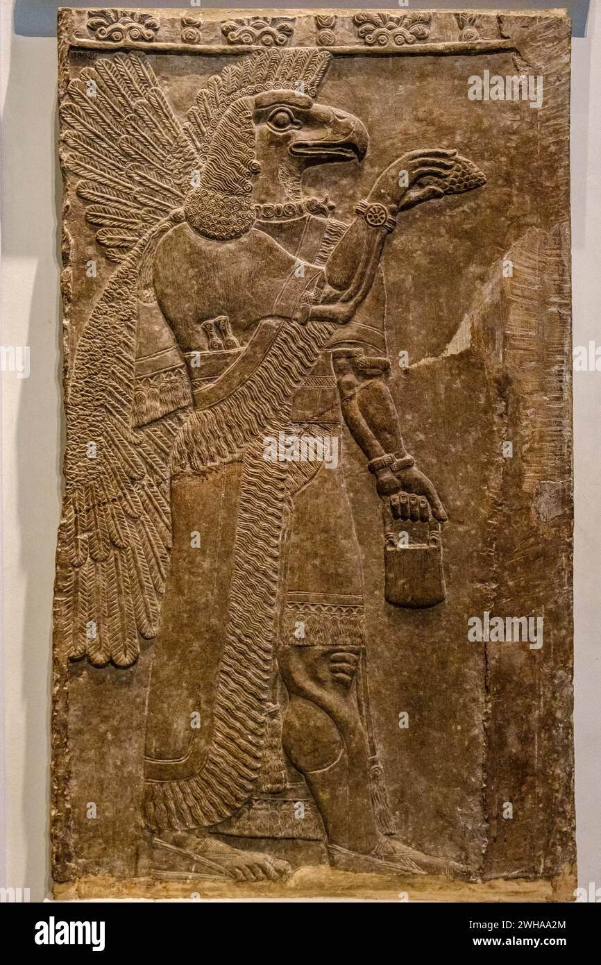 Esprit protecteur à tête d'aigle, Assyrien, 865-860 av. J.-C., de Nimrud, Temple de Ninurta, British Museum, Londres, Angleterre, Grande-Bretagne Banque D'Images