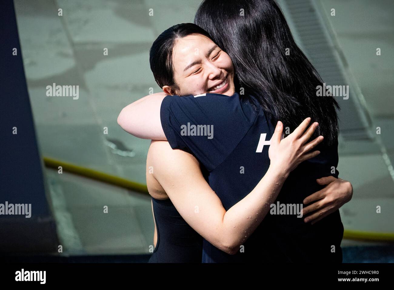 Doha, Qatar. 09th Feb, 2024. Suji Kim, coréenne, réagit après avoir remporté la médaille de bronze dans la finale de tremplin de plongeon féminin du 3m lors des 21es Championnats du monde de natation au Hamad Aquatic Center à Doha (Qatar), le 9 février 2024. Crédit : Insidefoto di andrea staccioli/Alamy Live News Banque D'Images