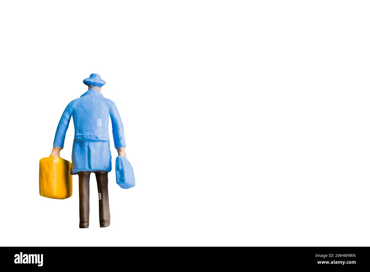 Personnes miniatures isolées sur fond blanc Banque D'Images