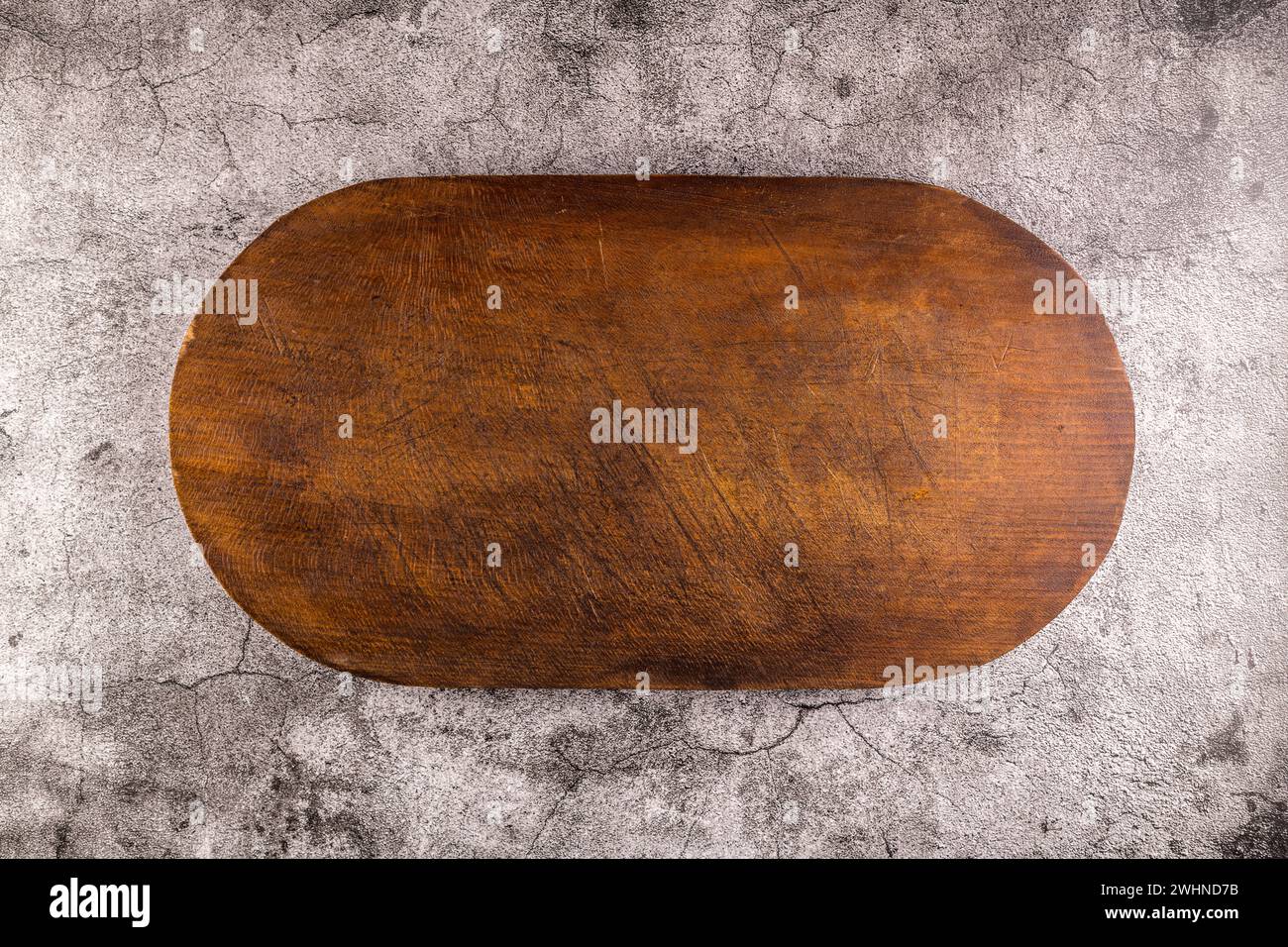 Planche à découper en bois de forme ovale Banque D'Images