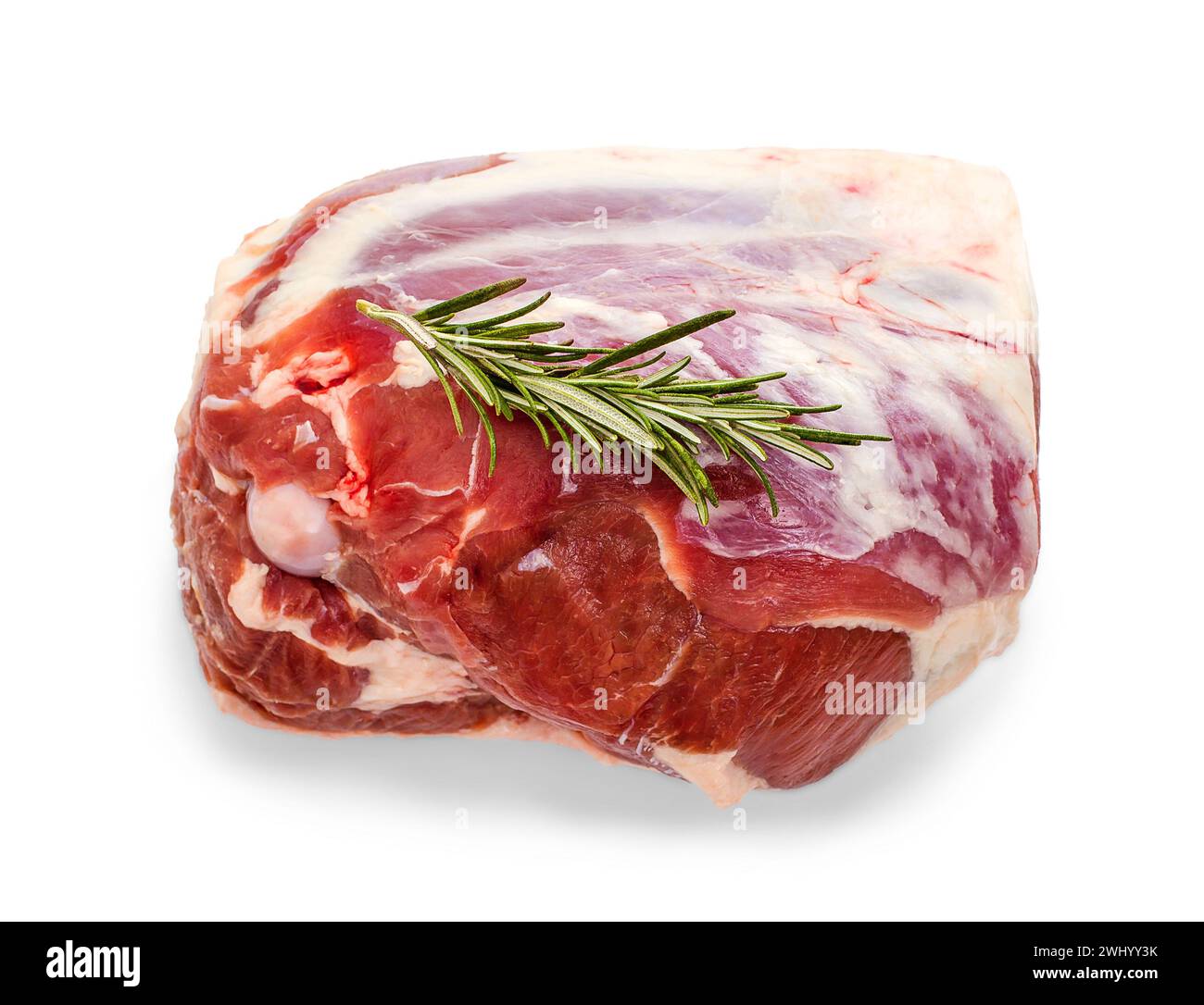 Cuisse d'agneau congelée avec brindille de romarin Banque D'Images