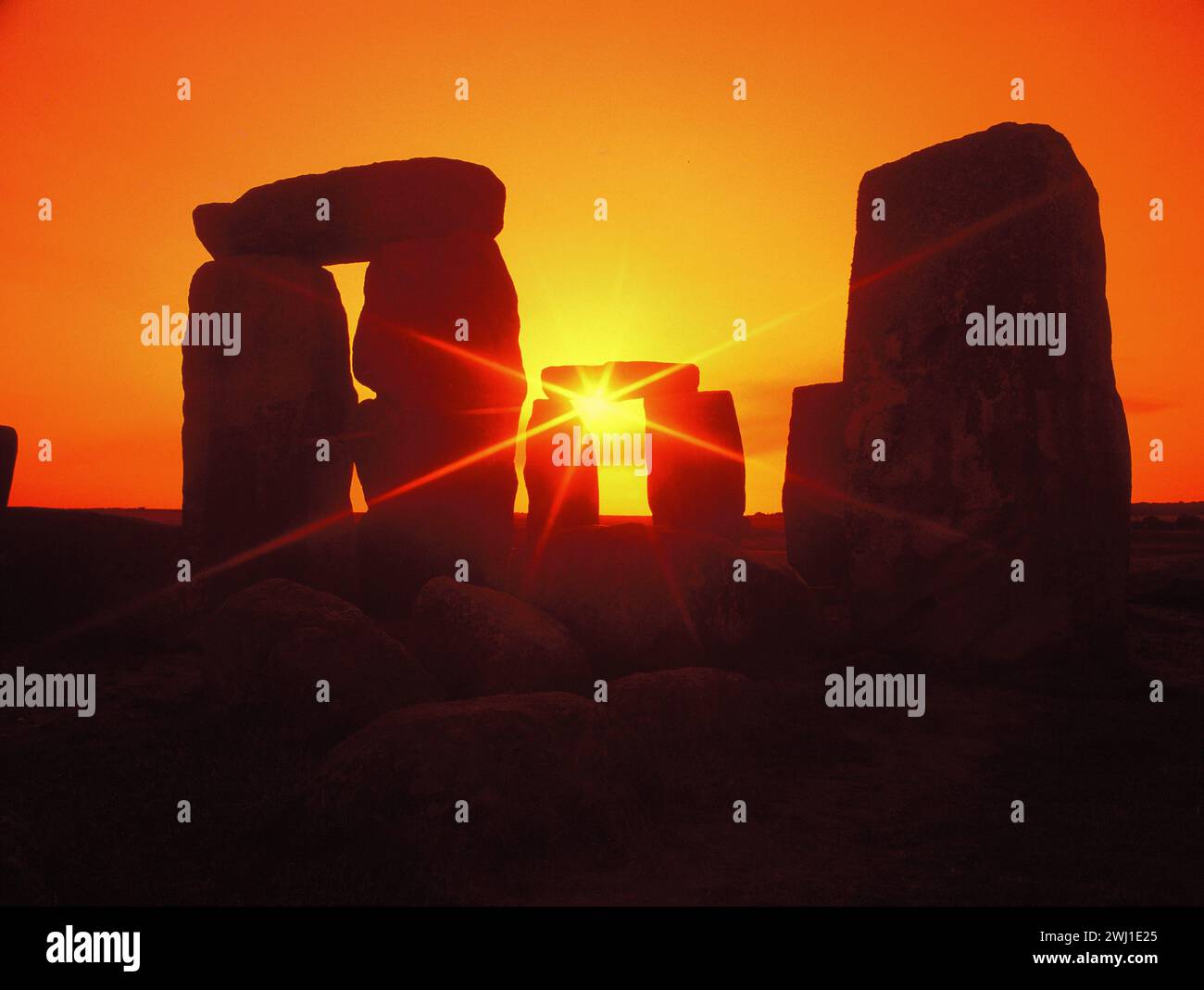 Royaume-Uni. Angleterre. Wiltshire. Stonehenge au coucher du soleil. Banque D'Images