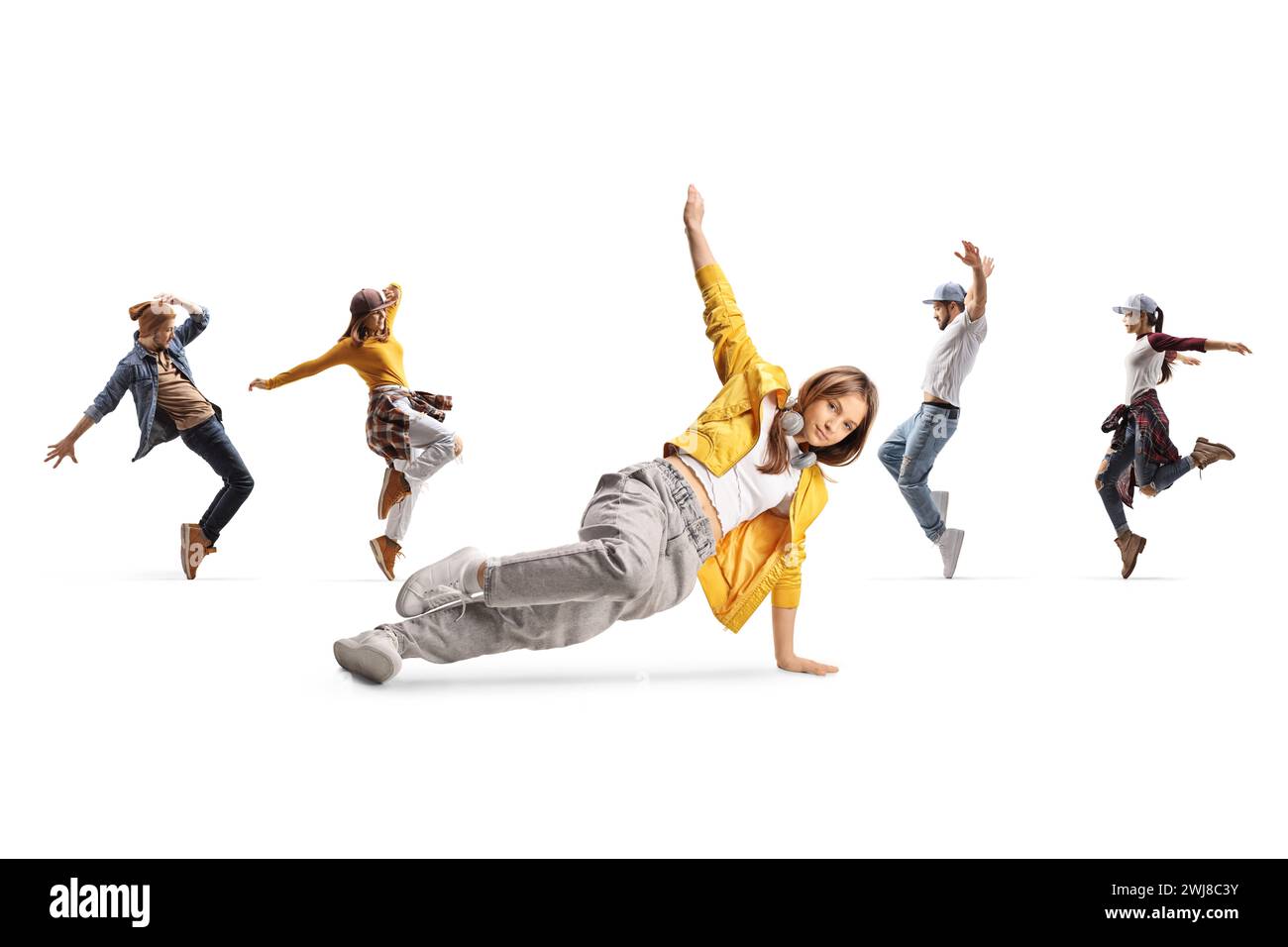 Groupe de personnes dansant et une jeune femme dans une pose de danse sur le sol isolé sur fond blanc Banque D'Images