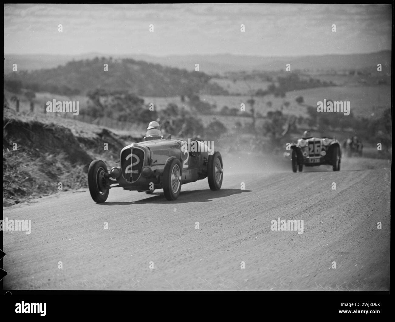 Voiture de course vintage Banque d'images noir et blanc - Alamy