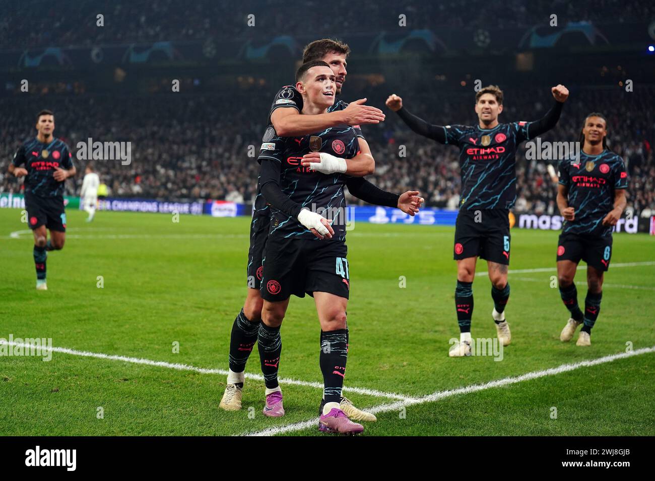 Phil Foden de Manchester City célèbre avoir marqué le troisième but de son équipe lors de la manche 16 de l'UEFA Champions League, match de première manche au stade Parken de Copenhague, Danemark. Date de la photo : mardi 13 février 2024. Banque D'Images