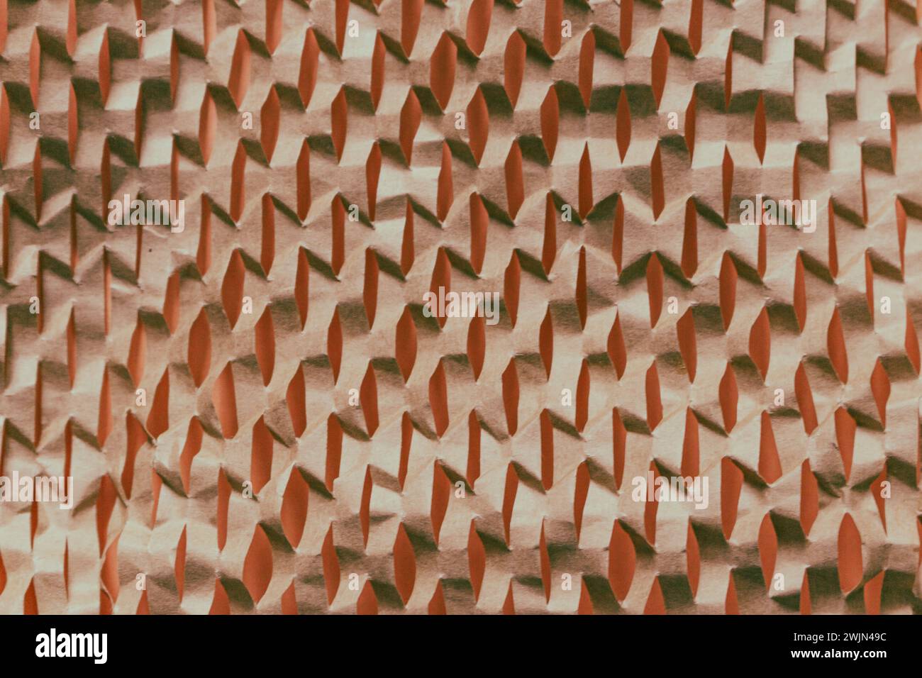 Fond texturé beige. Fond ondulé sur la couleur fuzz pêche. Motif côtelé. Fond de papier abstrait. Couleur fuzz pêche avec papier d'emballage Banque D'Images