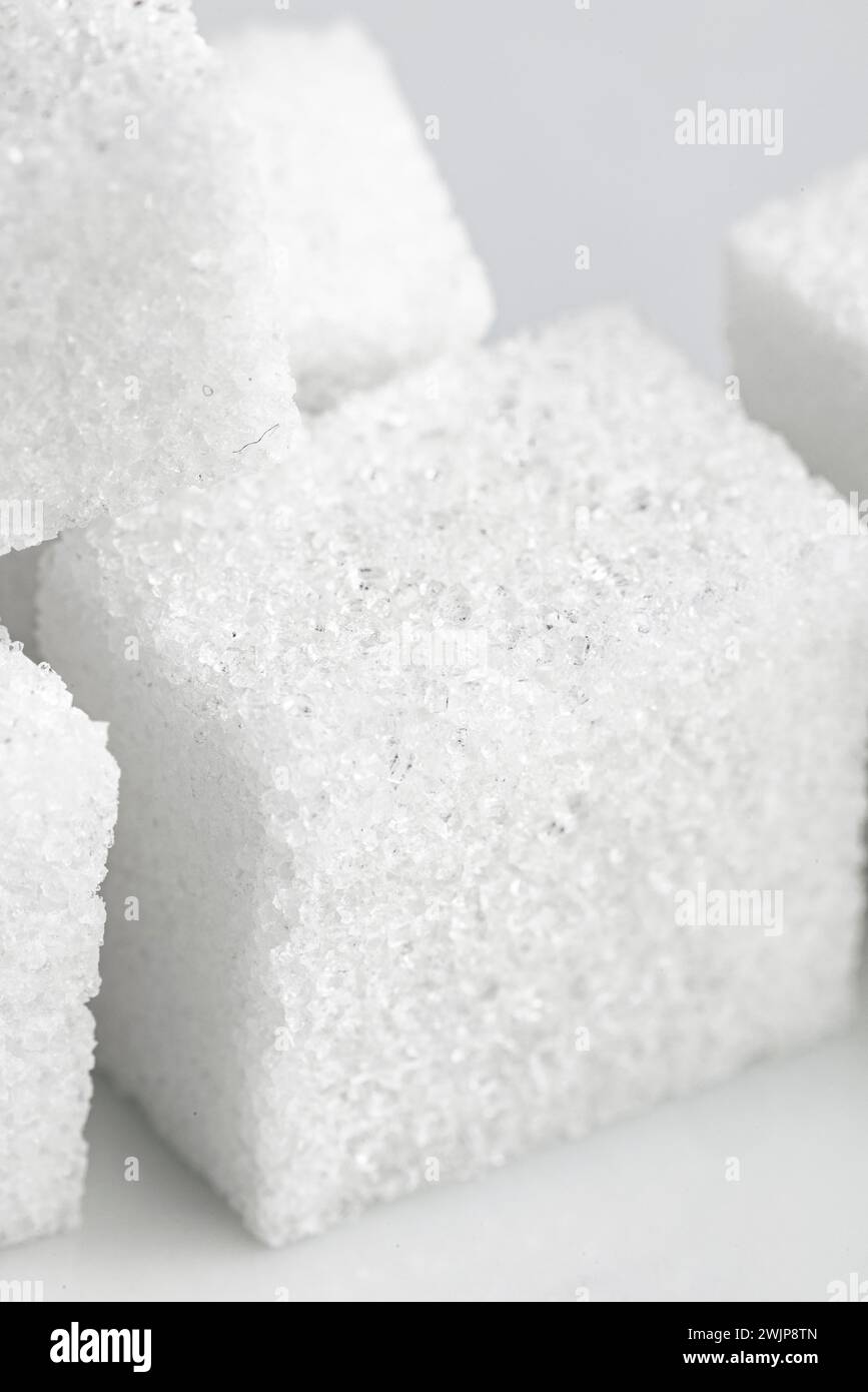 Macro absorption de cubes de sucre blanc Banque D'Images