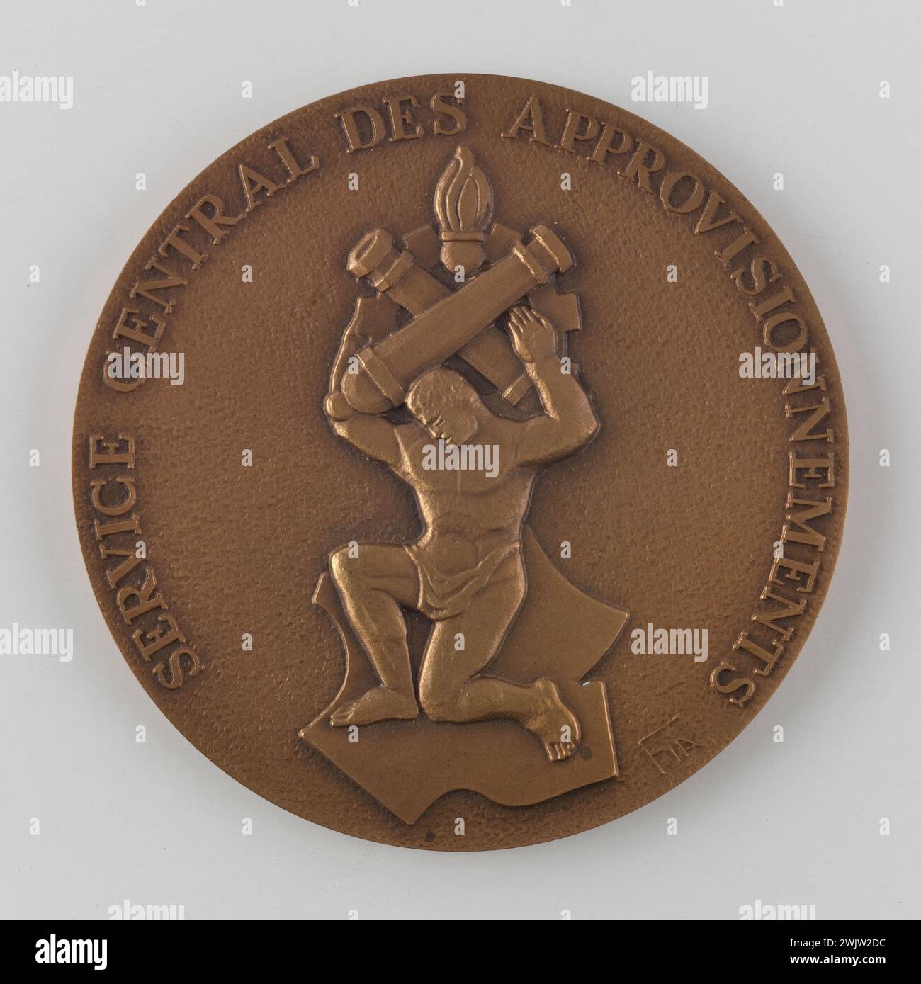 FIA. Médaille de présentation des fournitures centrales. Bronze, 1980-1990. Musée général Leclerc de Hauteclocque et de la libération de Paris, Musée Jean Moulin. Banque D'Images