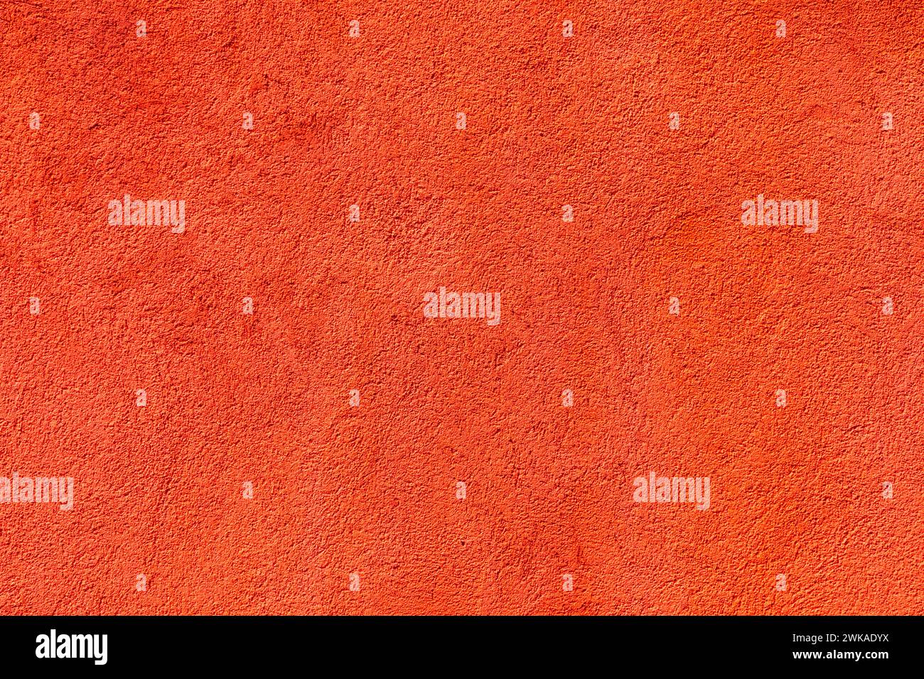 fond de mur de plâtre peint en rouge de couleur vive Banque D'Images fond de mur de plâtre peint en rouge de couleur vive Banque D'Images