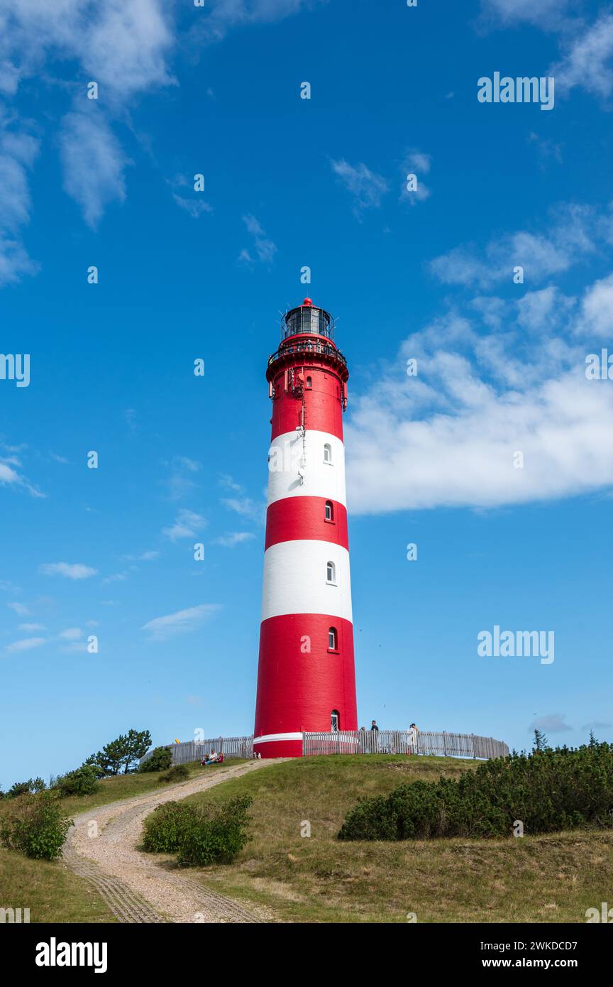 Der Rot-Weiße Leuchtturm von Amrum BEI Wittün ist das Wahrzeichen der Insel und weist den Schiffen den Weg durch das Wattenmeer Banque D'Images