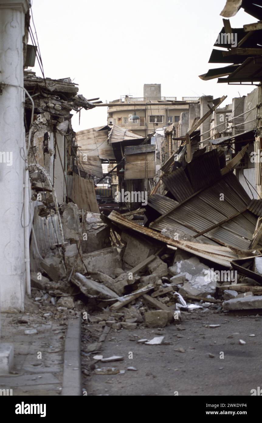 16 mars 1991 épave de boutiques dans la région de Safat Kuwait City, pillés et fire-bombardée par des soldats irakiens. Banque D'Images