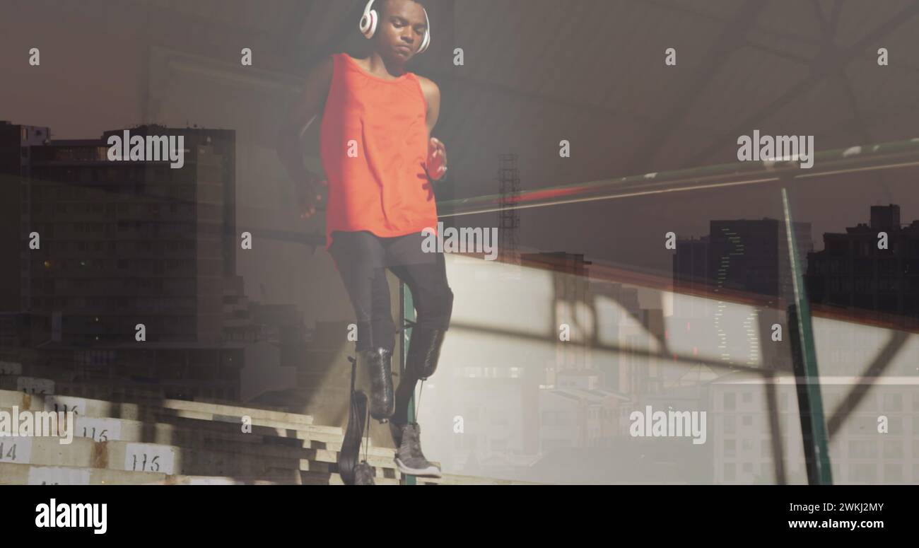 Image d'un paysage urbain sur un homme afro-américain handicapé avec des jambes artificielles en cours d'exécution Banque D'Images