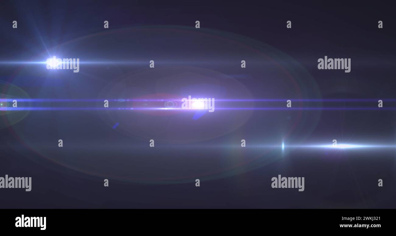 Image de faisceaux lumineux se déplaçant sur un arrière-plan sombre Banque D'Images