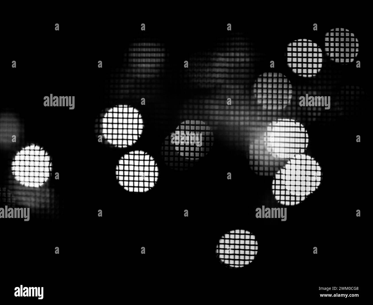 Bokeh de lumières sur fond noir Banque D'Images