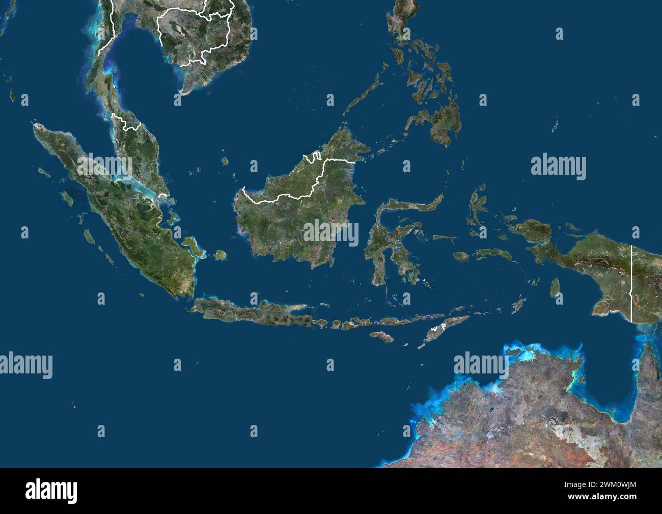Image satellite couleur de l'Indonésie et des pays voisins, avec frontières. Banque D'Images