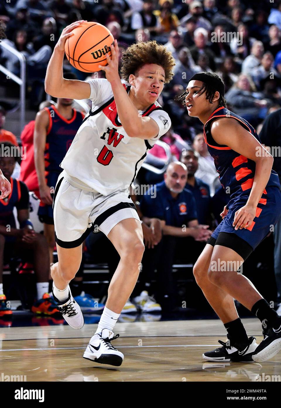 Riverside, CA. 23 février 2024. Harvard-Westlake Trent Perry (0) en action lors du match de championnat de basket-ball de l'école secondaire CIF-SS Open Division Boys entre Harvard-Westlake vs Roosevelt à l'Université Cal Baptist. Louis Lopez/Modern Exposure/Cal Sport Media/Alamy Live News Banque D'Images