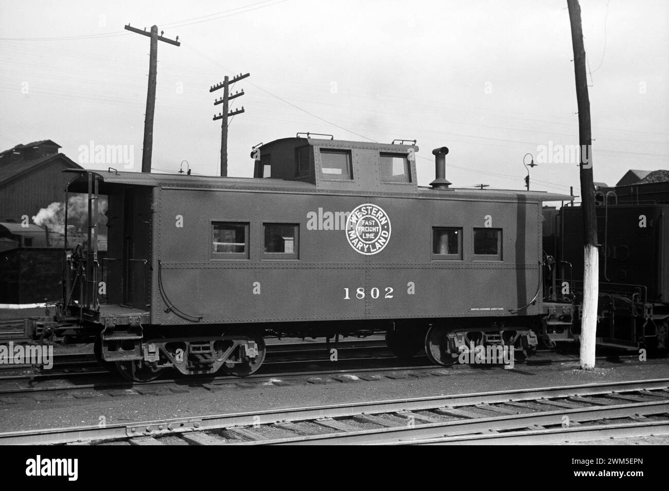 Caboose dans les gares de triage. Elkins, Virginie-occidentale - John Vachon photo 1939 Banque D'Images