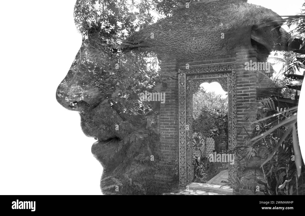 Portrait conceptuel de profil masculin en noir et blanc double exposition Banque D'Images