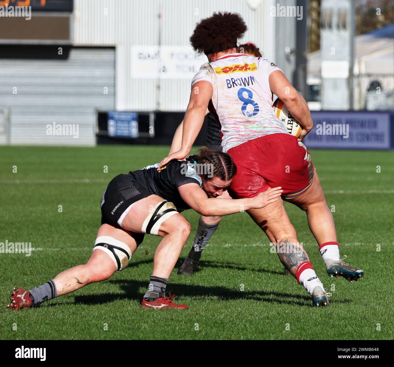 Exeter, Devon, Royaume-Uni. 24 février 2024. Allianz Premiership Women's Rugby : Exeter Chiefs v Harlequins Women at Sandy Park, Exeter, Devon, Royaume-Uni. Photo : Shaunagh Brown Tackled Credit : Nidpor/Alamy Live News Banque D'Images