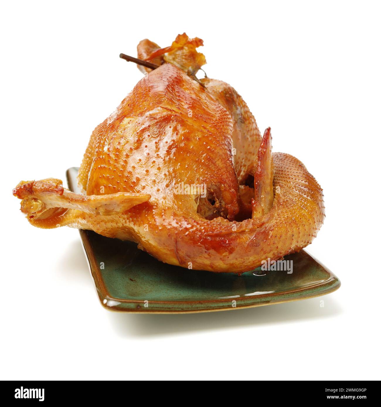 Poulet rôti sur fond blanc Banque D'Images