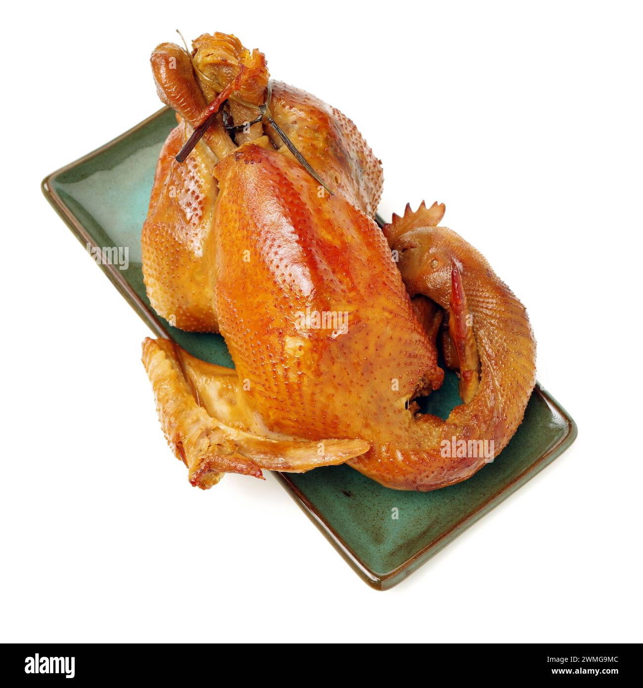 Poulet rôti sur fond blanc Banque D'Images