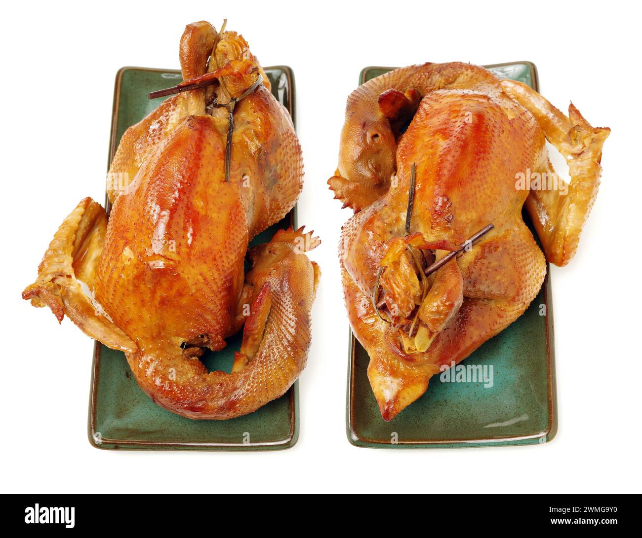 Poulet rôti sur fond blanc Banque D'Images
