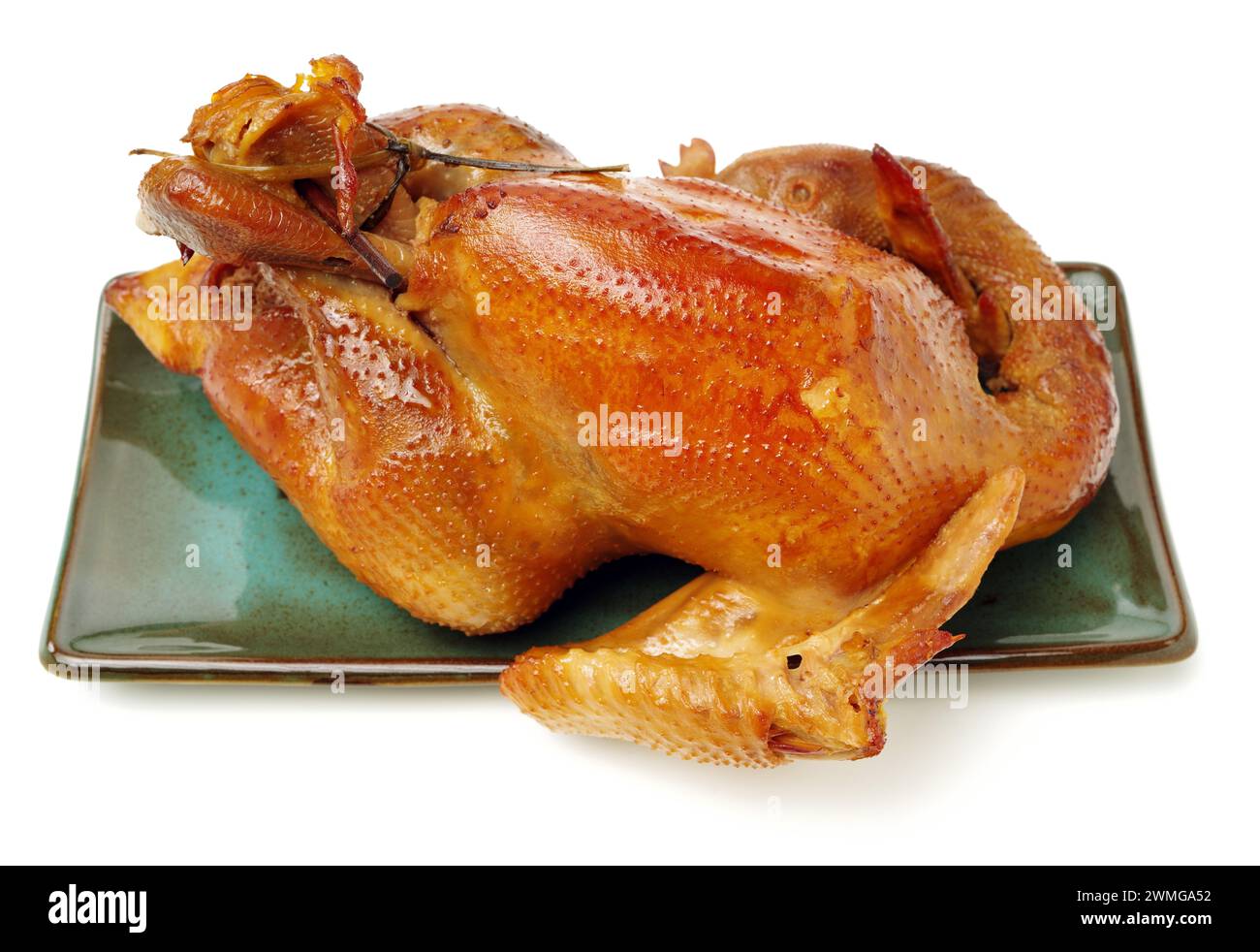 Poulet rôti sur fond blanc Banque D'Images
