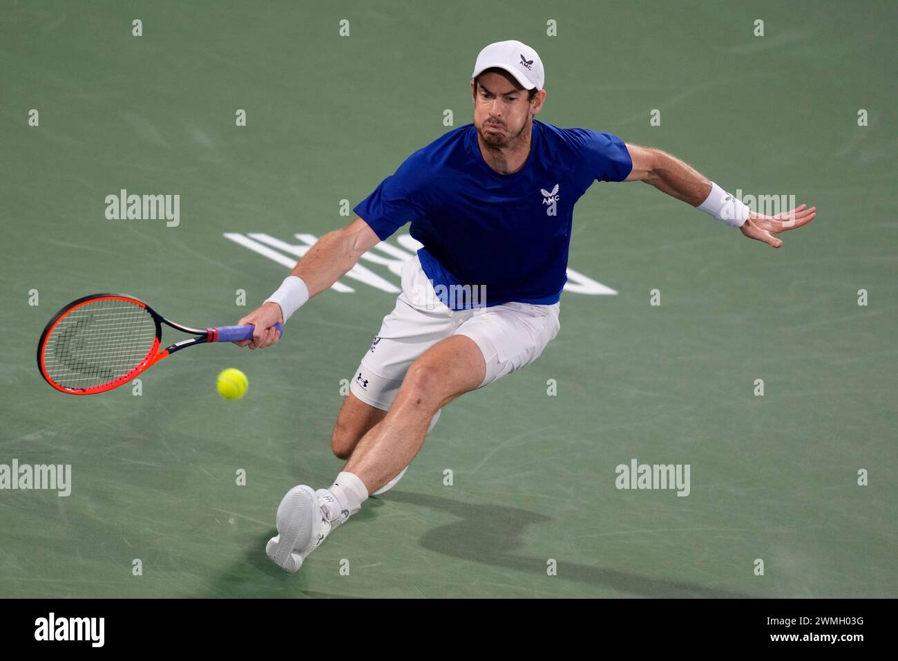 Andy Murray of Great Britain returns the ball to Denis Shapovalov of Canada during a match of the Dubai Duty Free Tennis Championships in Dubai, United Arab Emirates, Monday, Feb. 26, 2024. (AP Photo/Kamran Jebreili) Banque D'Images