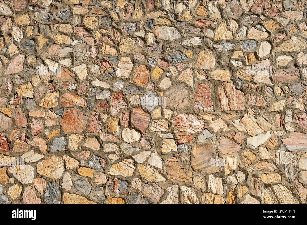 motif mosaïque multicolore. mosaïque en pierre faite de pierre et d'argile. arrière-plan Banque D'Images