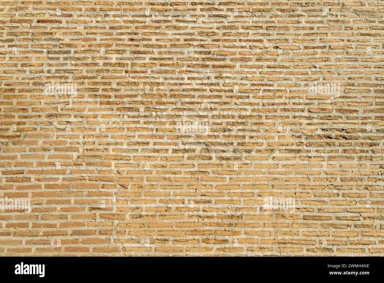 Texture ou fond de mur de briques. le fond est fait de brique brune mince. mur Banque D'Images