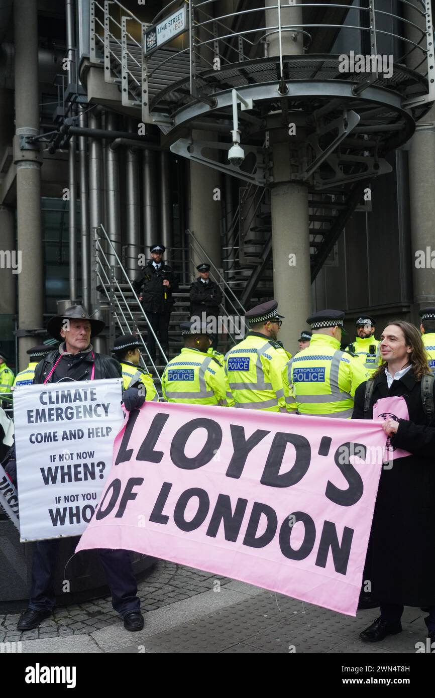 Les activistes climatiques d’extinction Rebellion ciblent Lloyds pour protester contre le rôle de l’industrie mondiale de l’assurance travaillant pour l’industrie des combustibles fossiles. Banque D'Images
