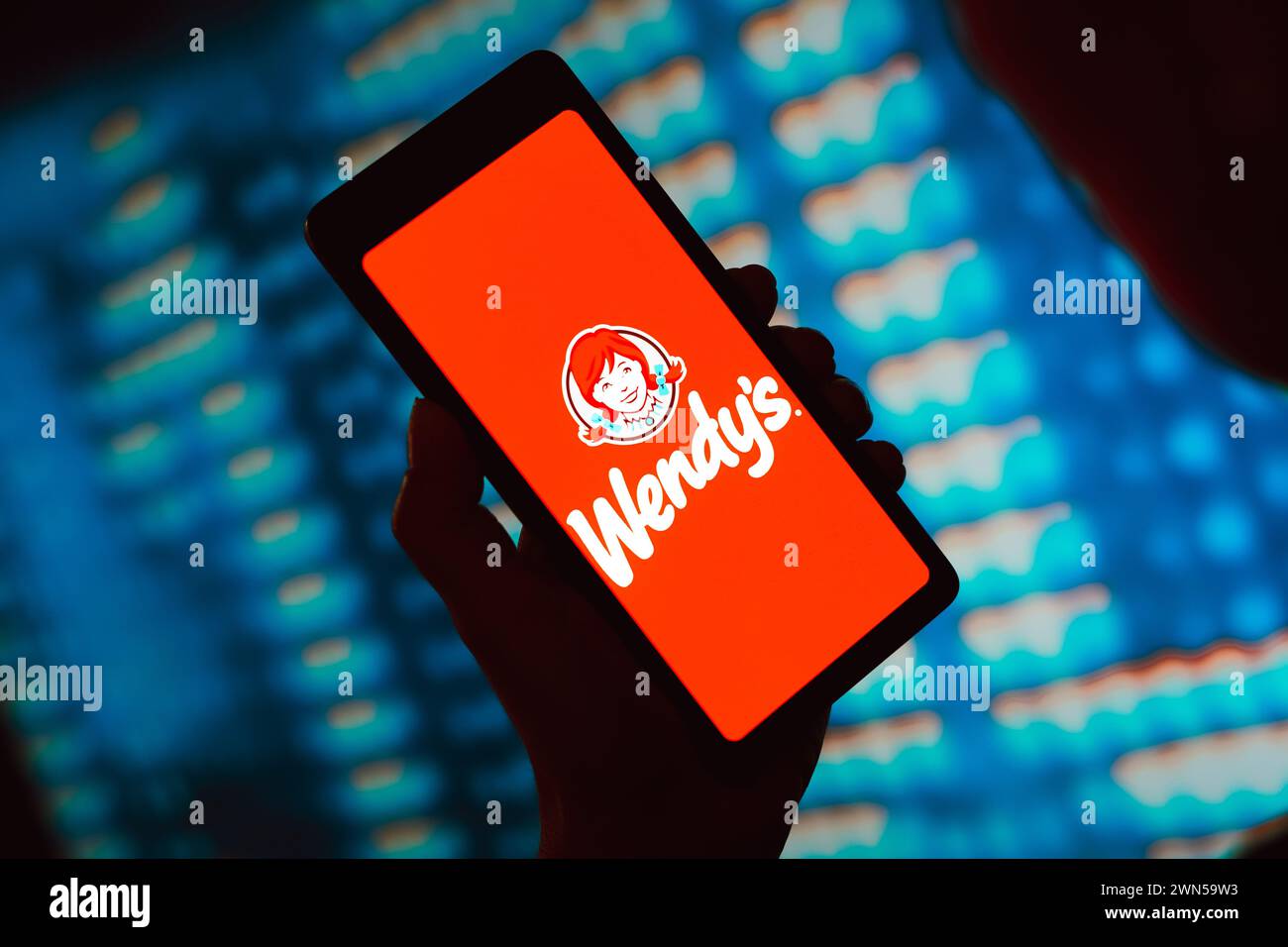 Dans cette illustration photo, le logo de Wendy's est affiché sur l'écran d'un smartphone. Banque D'Images