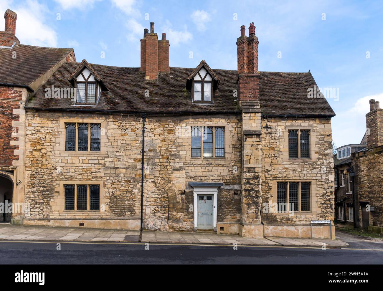 Maison médiévale construite en pierre, 12 Minster Yard, Lincoln City, Lincolnshire, Angleterre, ROYAUME-UNI Banque D'Images