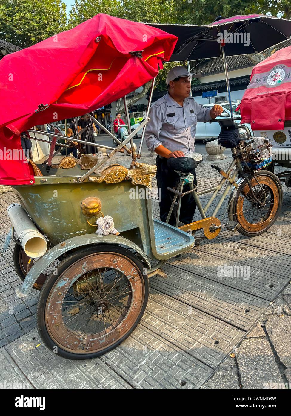 Suzhou, Chine, travailleurs migrants chinois, chauffeurs de rickshaw, scènes de rue, centre historique de la vieille ville Banque D'Images