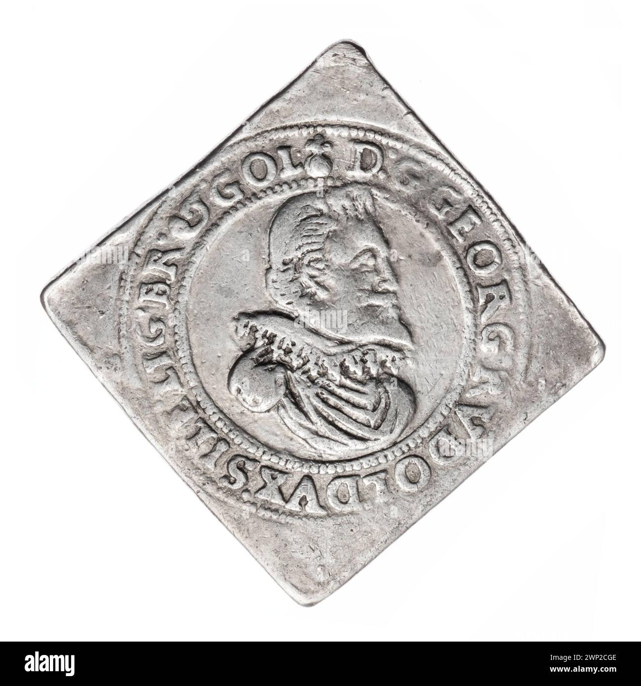 Thaler argenté représentant le prince Jerzy Rodolphe de Legnica (1595-1653), avec des portraits en armure de défilé, des armoiries de la famille Piast et des boucliers sous des casques ornés de bijoux. Banque D'Images