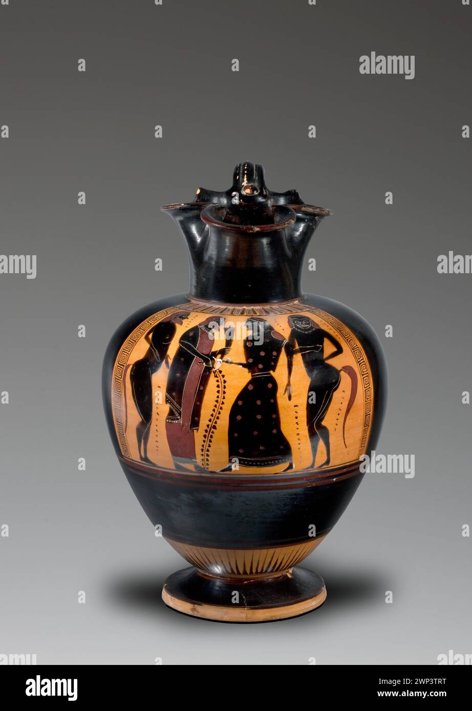 Un ancien oinochoe grec datant d'environ 540 av. J.-C. représentant Dionysos, Ariane et un satyre, illustrant l'art céramique de la période archaïque et des figures mythologiques, conservés dans une collection historique. Banque D'Images