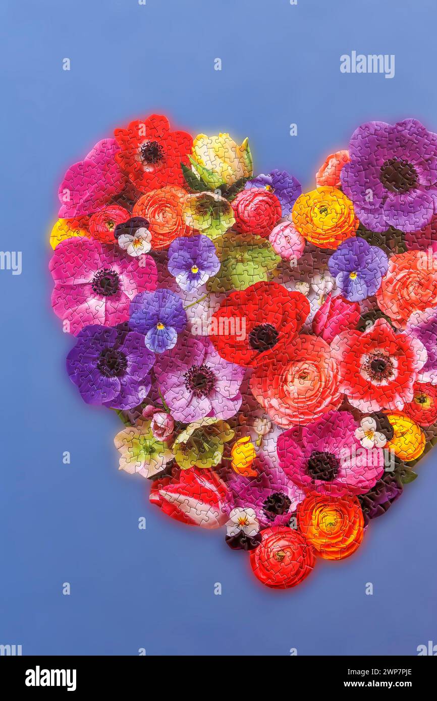 Un puzzle de fleurs en forme de coeur Banque D'Images